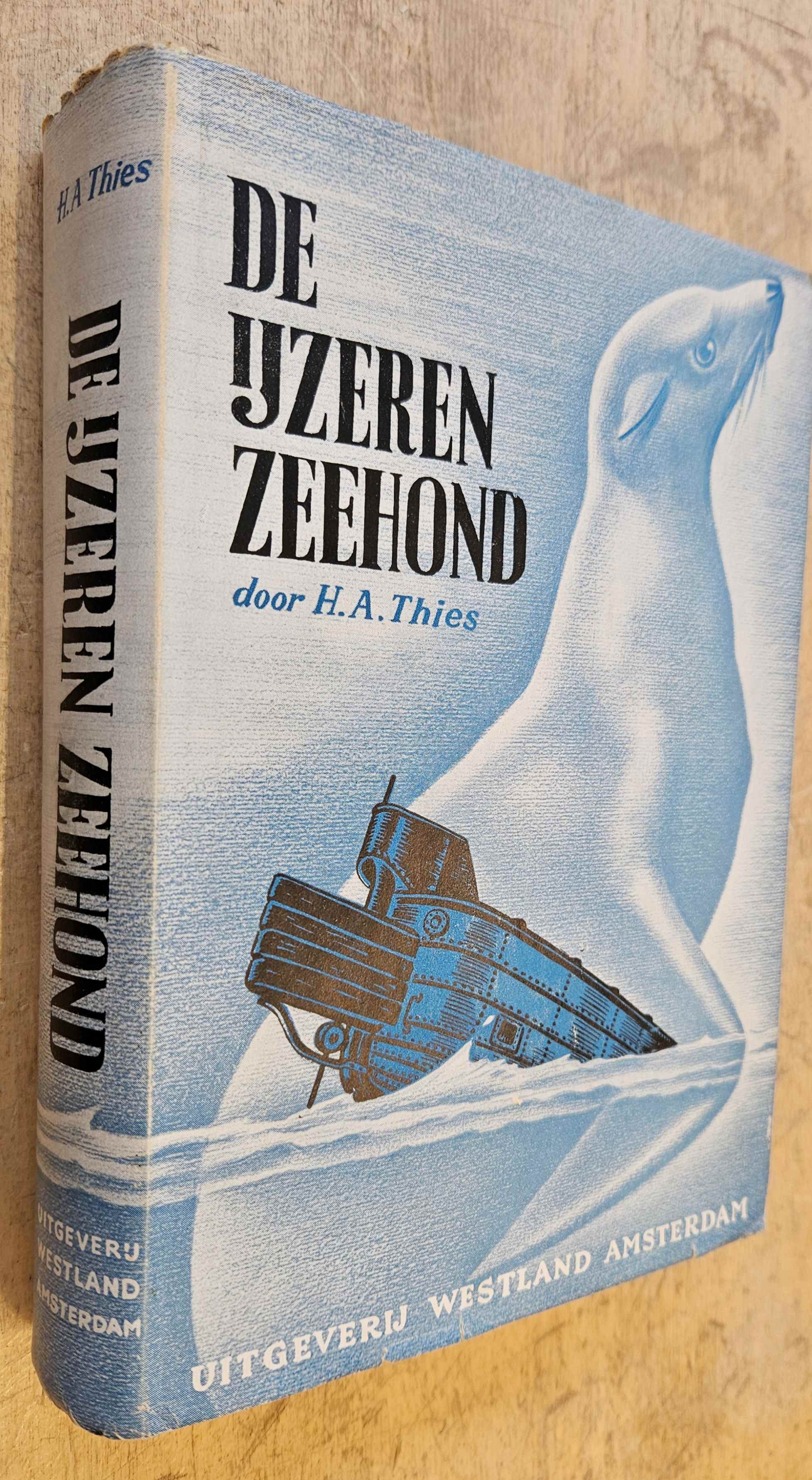 Thies, Hans Arthur - De ijzeren zeehond. [Met stofomslag]